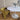 Witte marmeren ronde eettafel van Ditto Design met een diameter van 120 cm, elegante tulpvormige pooten.